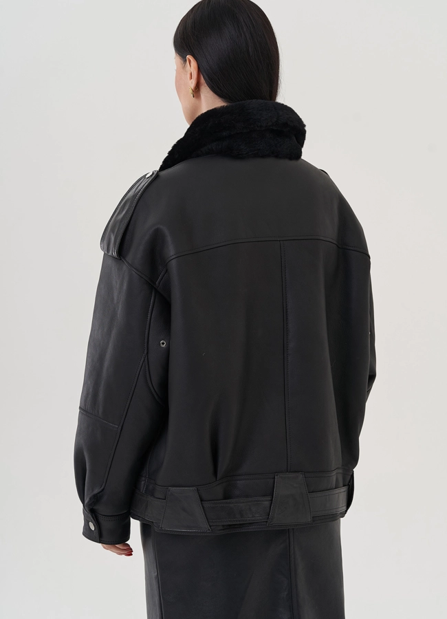 Женская дубленка черного цвета  модель № 25632 универмаг малина